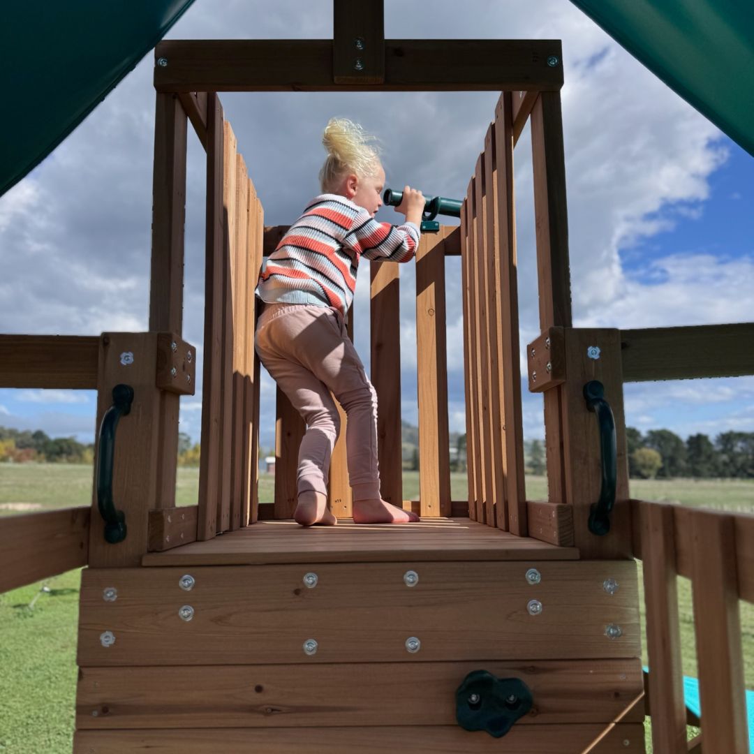Crow's Nest Play Centre With Child In Crow's Nest Lookout Using Play Telescope