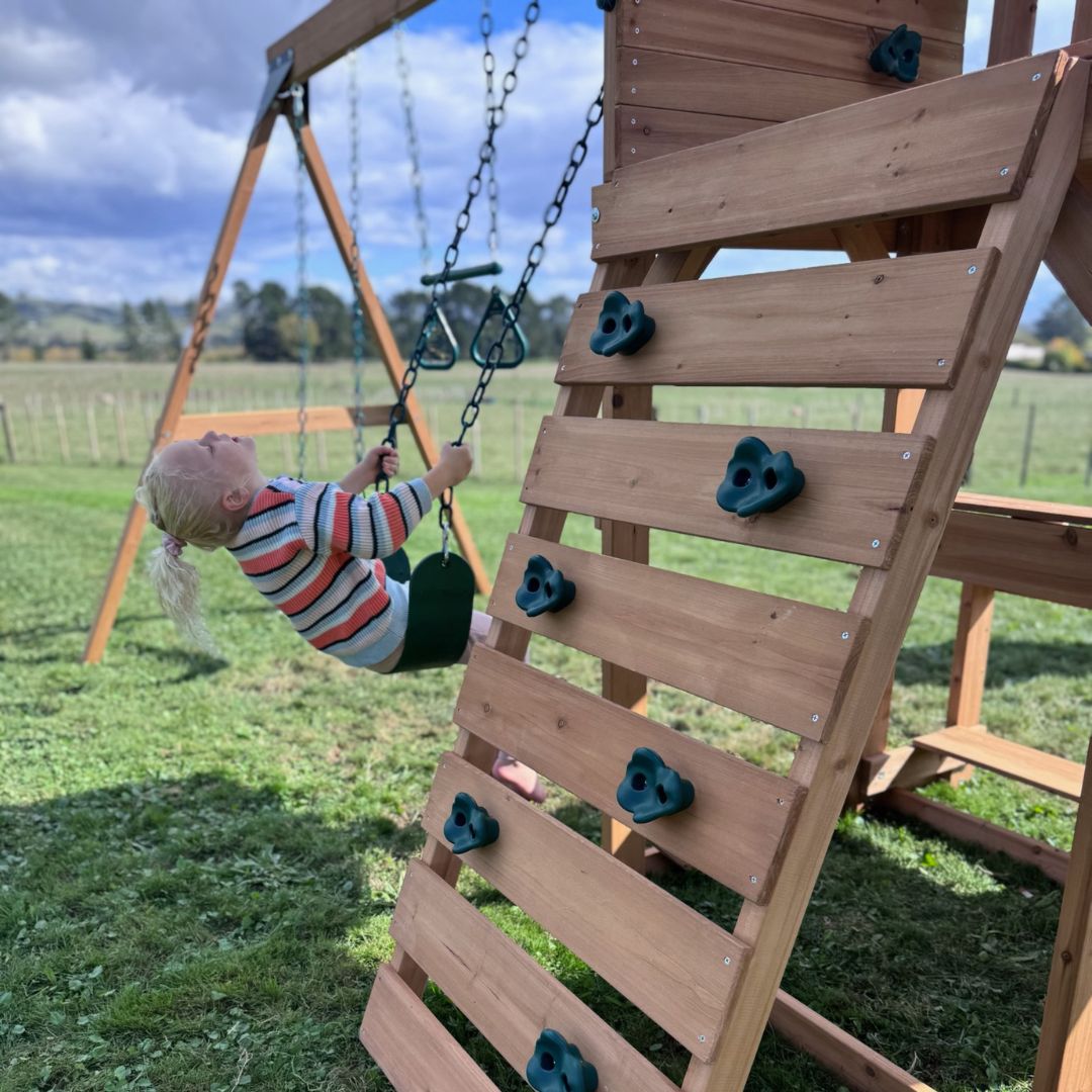 Crow's Nest Play Centre With Child Playing On Swing Set