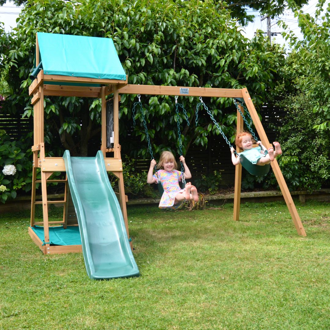 Poppet Park Play Centre Children Using Swing Set